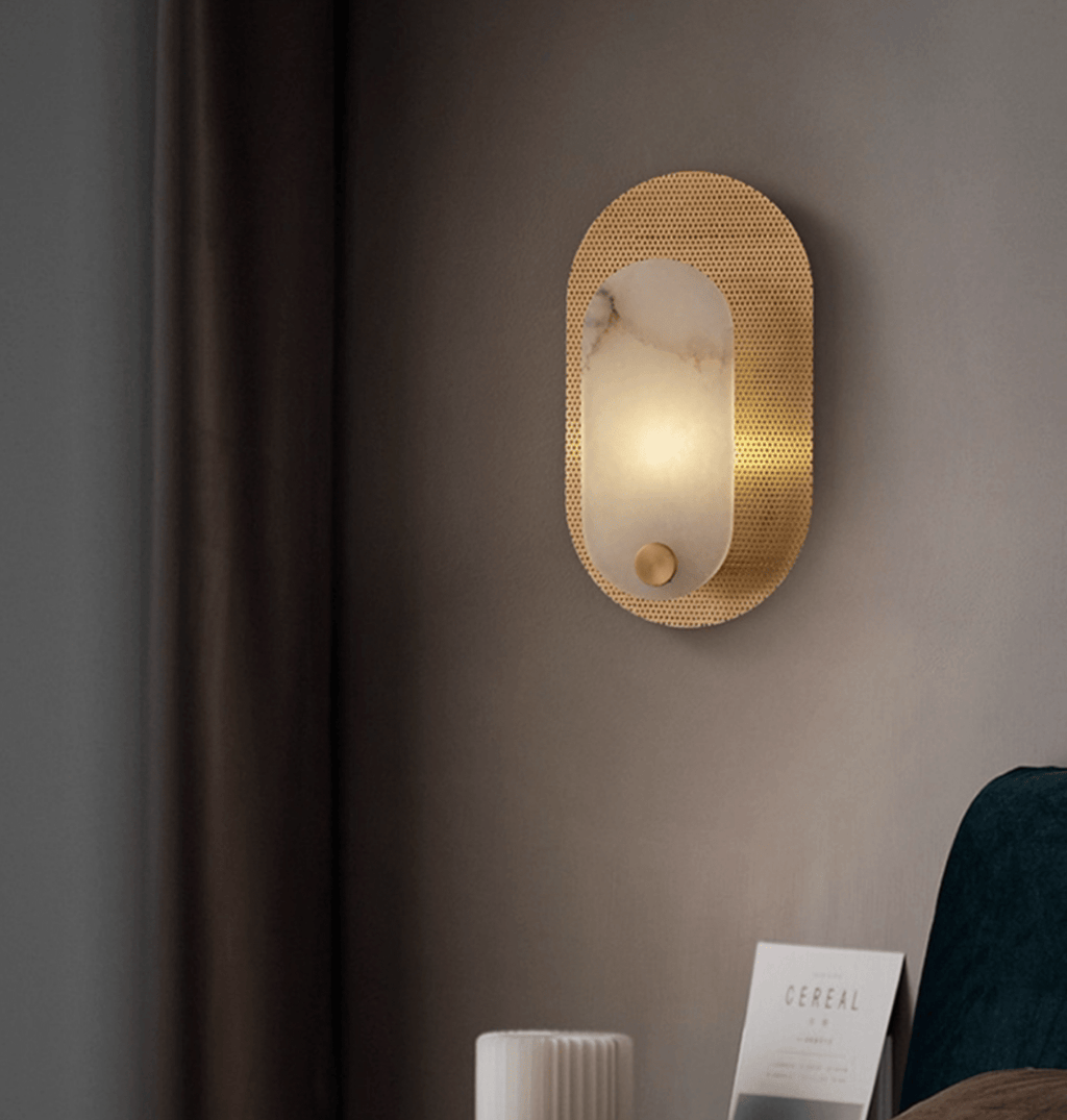 The sconce lit in the bedroom corner, seen from further back with the curtain to the left.