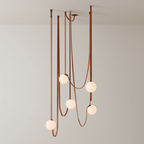Belt pendant light installation detail showing canopy and belts