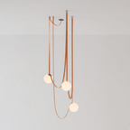 Belt pendant light glass globe and hardware detail