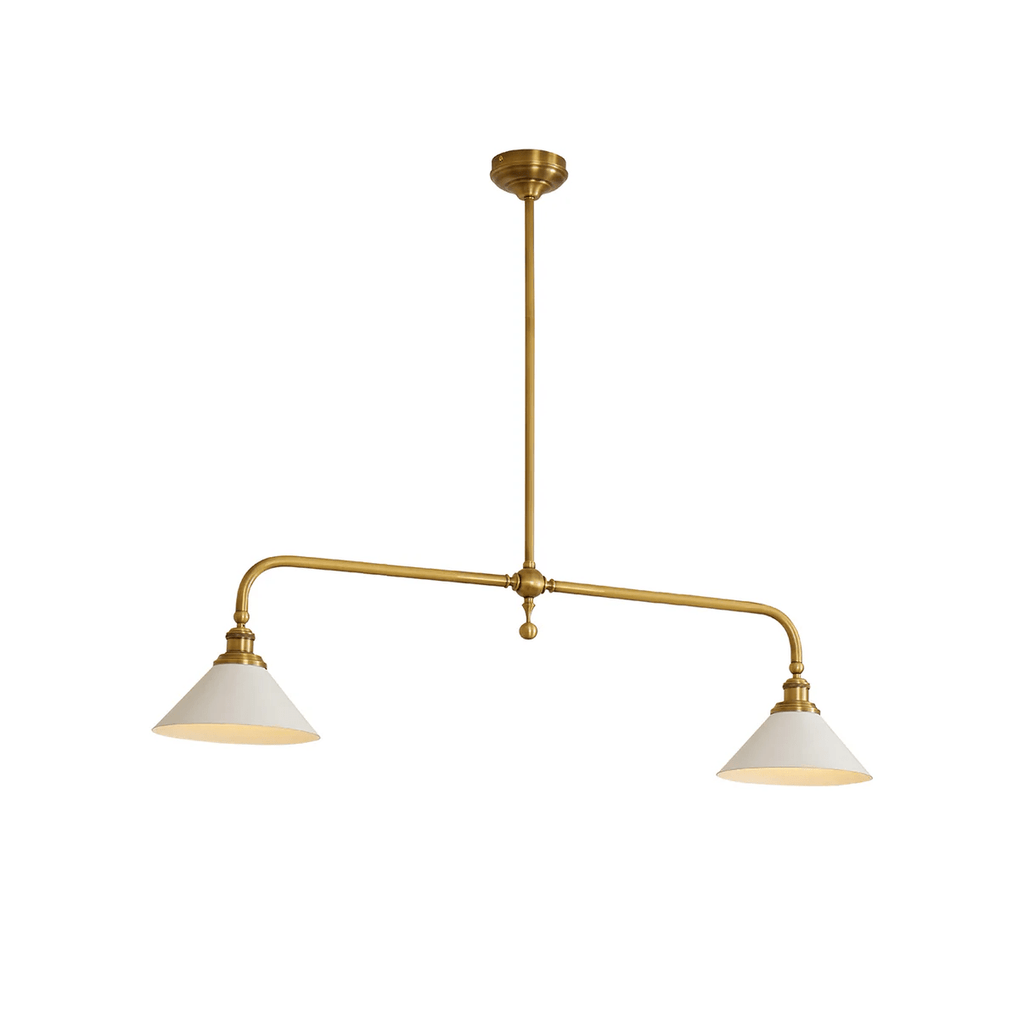 This brass-finish Clérachic pendant glows warm on a white background, its two shades hanging level.