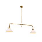 Arms swept wide above two matching shades, this brass-finish Clérachic pendant glows warm on a white background.