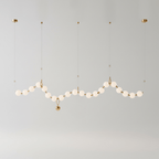 Necklace pendant light linear layout of white globes