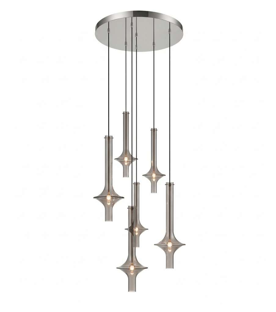 A cluster of Clérachic pendants in pewter-toned metal hangs from a round ceiling plate, shown unlit against a plain white backdrop.