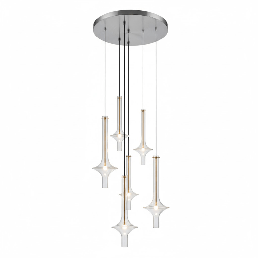 Six Clérachic pendants in clear glass cascade at staggered heights from a round nickel canopy, glowing warm against a white backdrop.