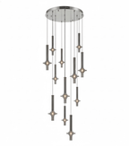 A tall cascade of Clérachic pendants in dark pewter-toned glass drops through several tiers from a round canopy, lit against white.