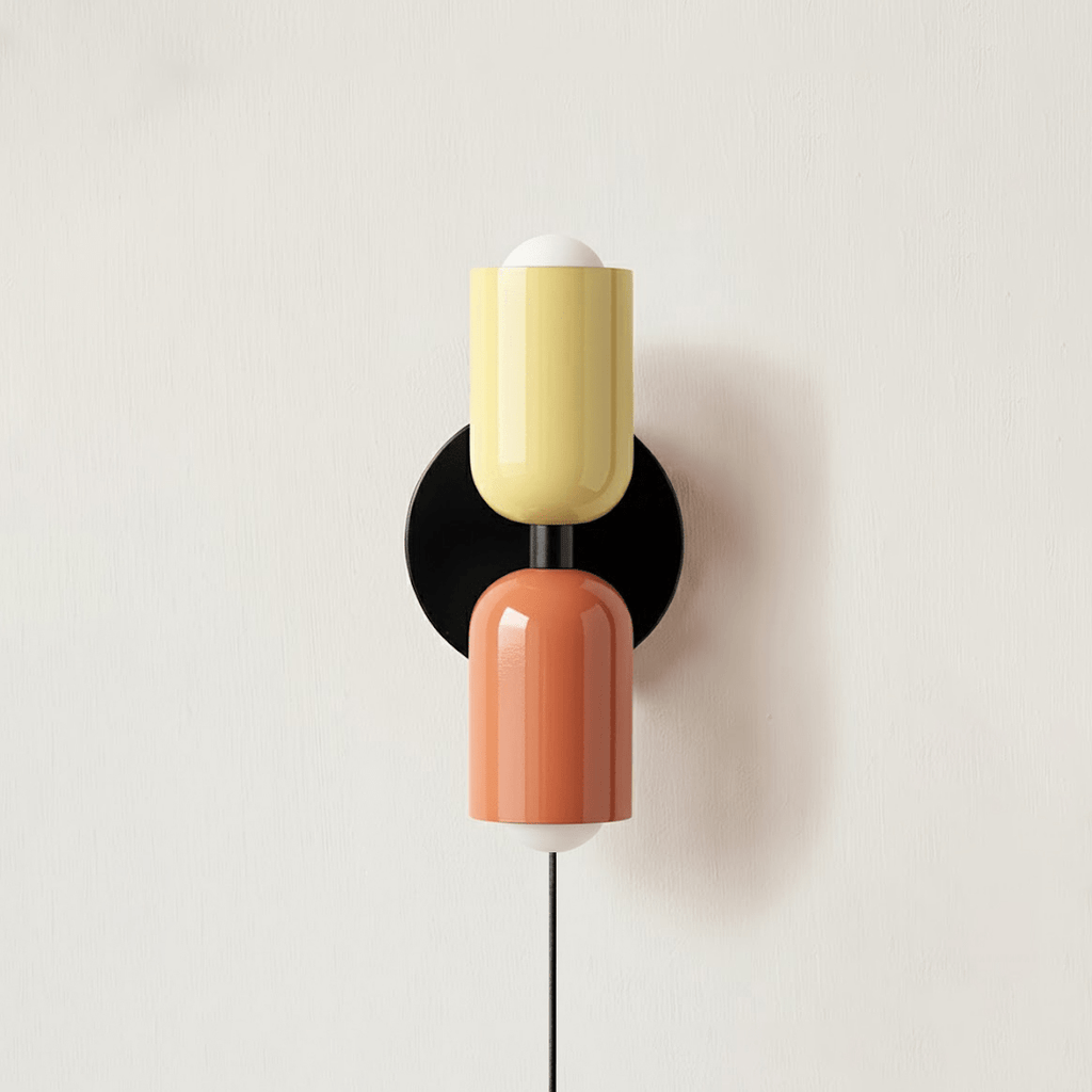 Plug-in wall lamp shown with its inline switch and cord