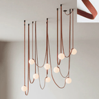 Iron frame and woven canvas straps of the Multiple Belt Art Pendant Light