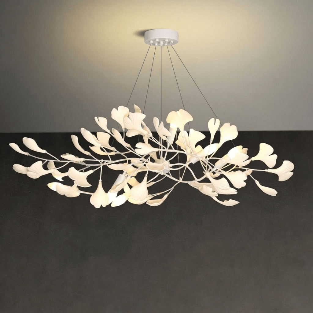 Close view of porcelain ginkgo leaves on brass branches