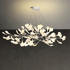 Close view of porcelain ginkgo leaves on brass branches