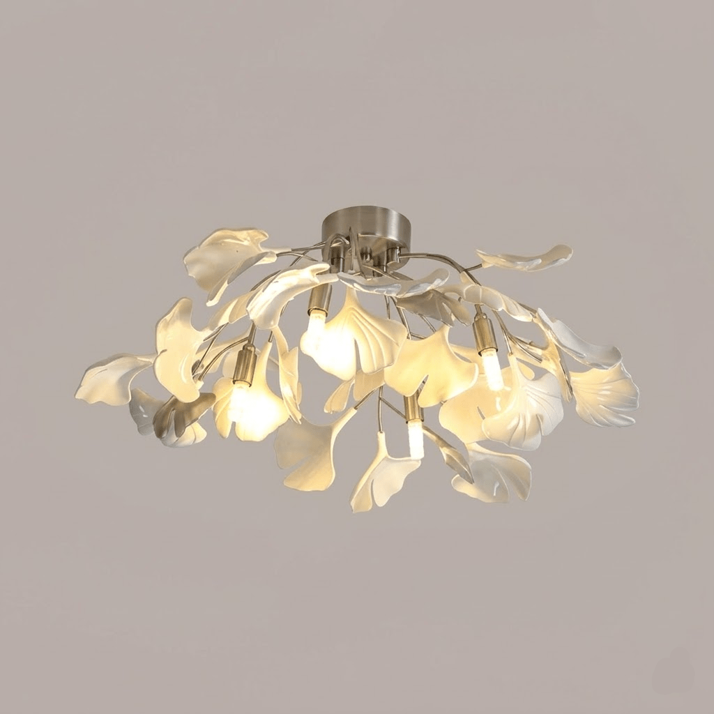 White ceramic leaf shades around bright globe bulbs