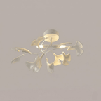Detail of layered ceramic ginkgo leaves on the gold body