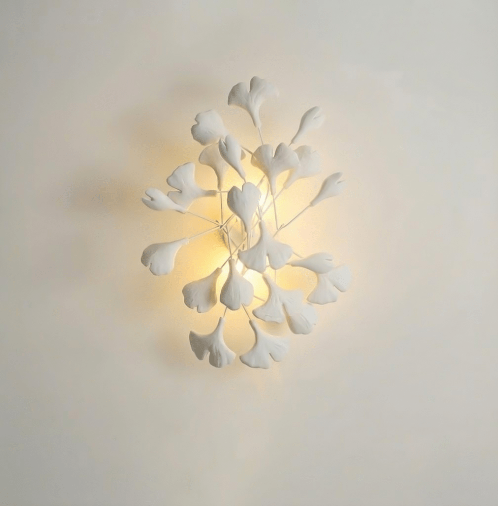 Porcelain ginkgo leaf wall lamp with a warm underglow