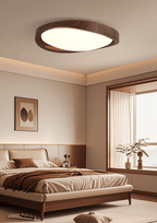 Walnut ceiling light edge profile detail on white background