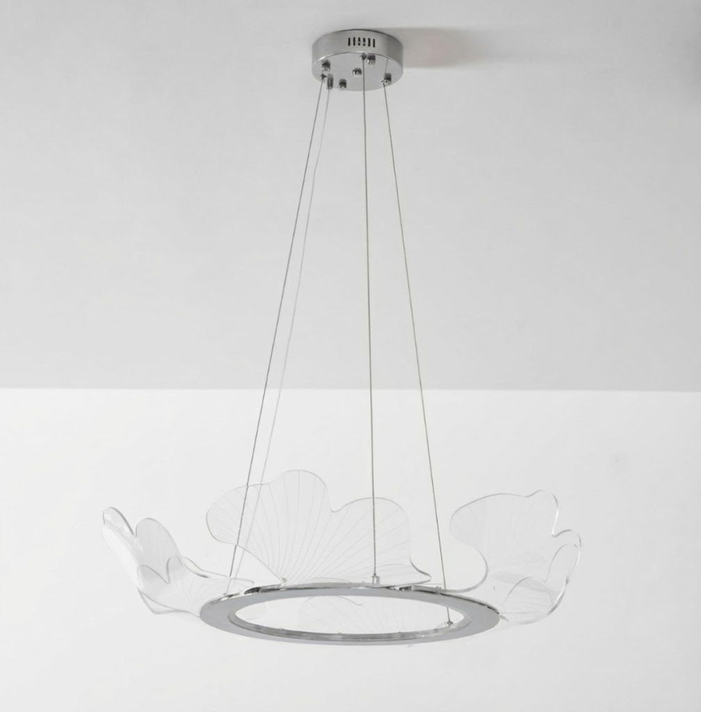Gold leaf chandelier shown lit and unlit side by side