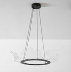 Clear acrylic gold leaf chandelier with a warm glow