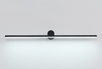 Studio shot of a Clérachic wall light glowing cool white against a plain backdrop, front view.
