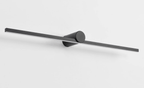 Studio shot of an unlit Clérachic wall light, angled to show its slim bar and round pivot mount.