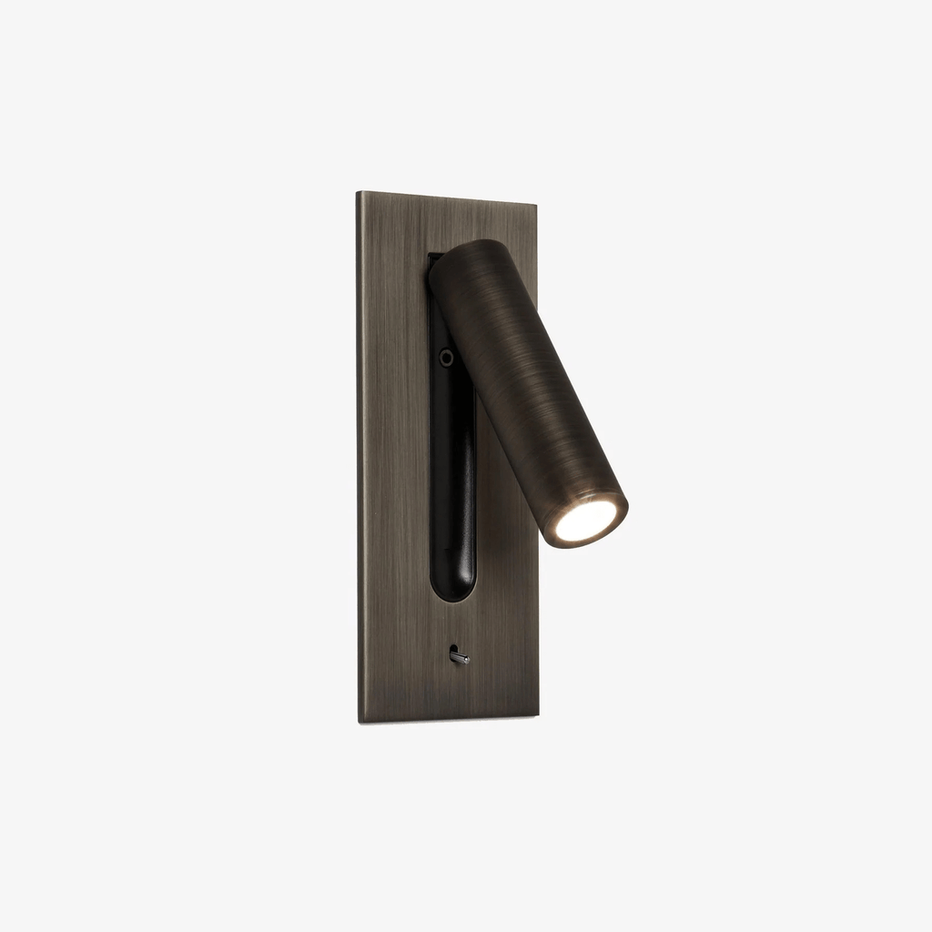 A bronze Clérachic reading light shown unlit on a plain white background, head folded down.