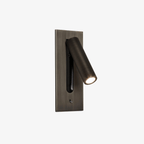 A bronze Clérachic reading light shown unlit on a plain white background, head folded down.
