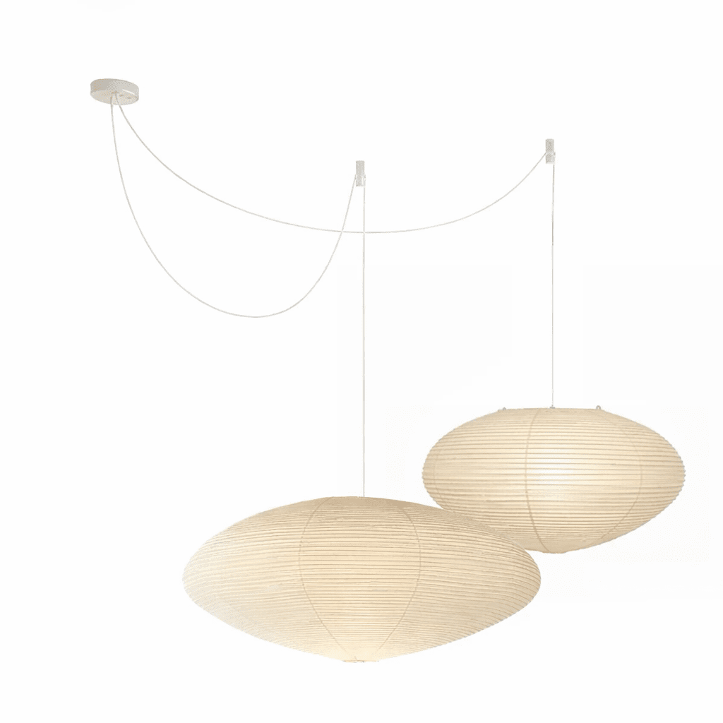 Large washi paper pendant glowing softly over a table