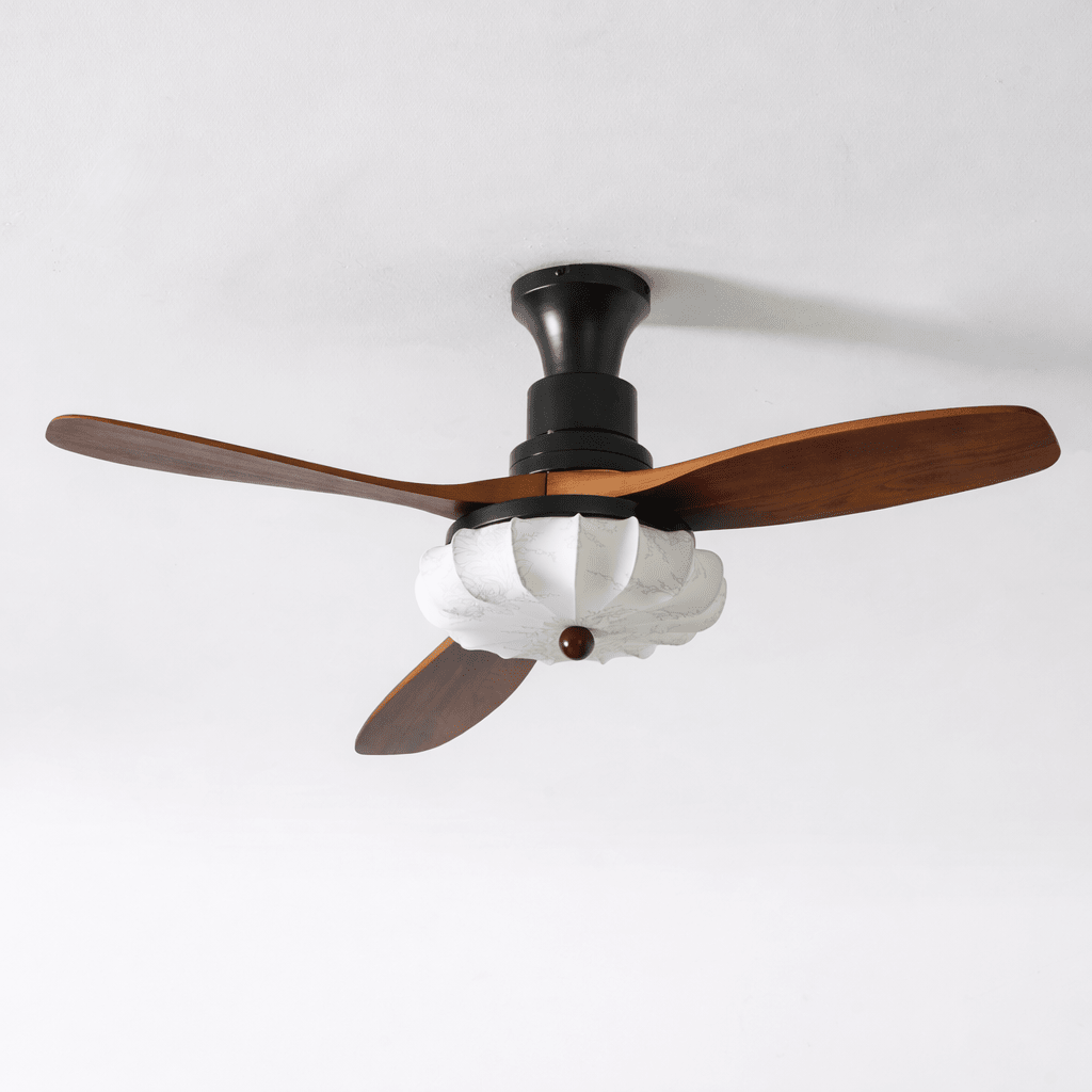 Close detail of the printed lotus fabric shade on the ceiling fan