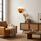 Petalia wall sconce amber glass shade with a warm decorative glow