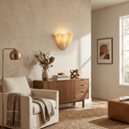 Petalia wall sconce amber finish mounted on a styled wall