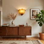 Petalia wall sconce beige petal shade glowing in a soft interior