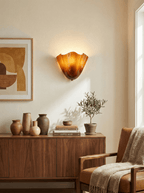 Petalia wall sconce green finish shown in a calm interior