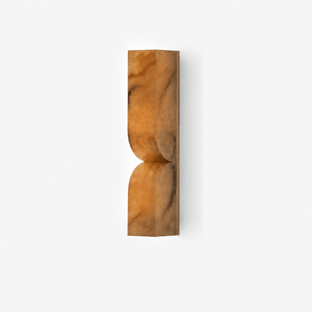 White carved alabaster wall light showing natural stone veining