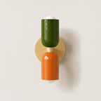 Up-down wall lamp lighting a quiet interior corner