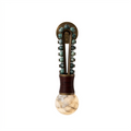 Against a plain backdrop, this Clérachic wall light shows a darker frame strung with teal-green beads above the globe.