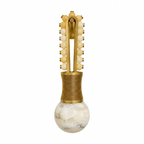 Alone against white, this Clérachic wall light displays pale cream beads climbing a brass frame to the alabaster globe below.