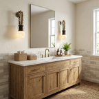 Flanking a mirror above a light wood vanity with subway tile, this Clérachic wall light casts a soft glow on either side.