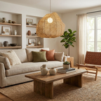 This Clérachic pendant hangs above a wood coffee table near a cream sofa with colourful cushions.