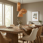 A woven rattan cluster of cylinder, pumpkin, and cone Clérachic pendants glows above a reclaimed-wood dining table.