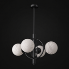 This Clérachic chandelier in matte black is shown from the side, its rings forming an open, orbital cage.