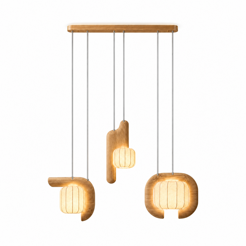 From a slightly different angle, this three-light Clérachic fixture in light wood shows its three glowing shade shapes.