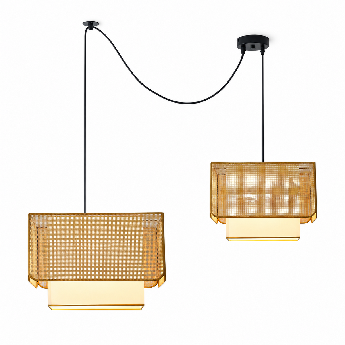 Two of these Clérachic pendants hang at different heights from swagged cords, their rattan box shades glowing warm.