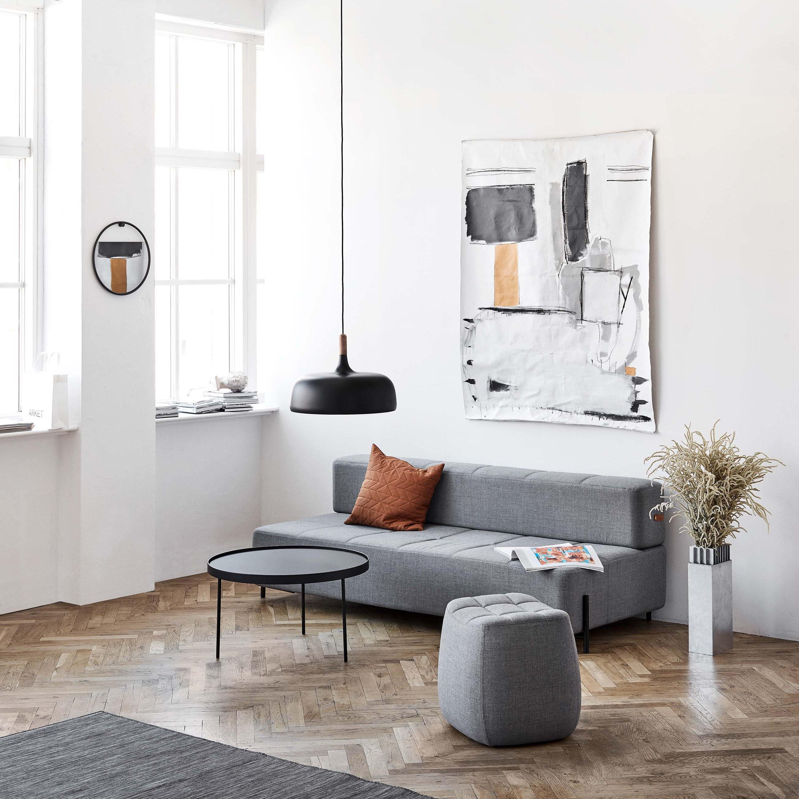 Acorn pendant light shown lit with a warm globe bulb