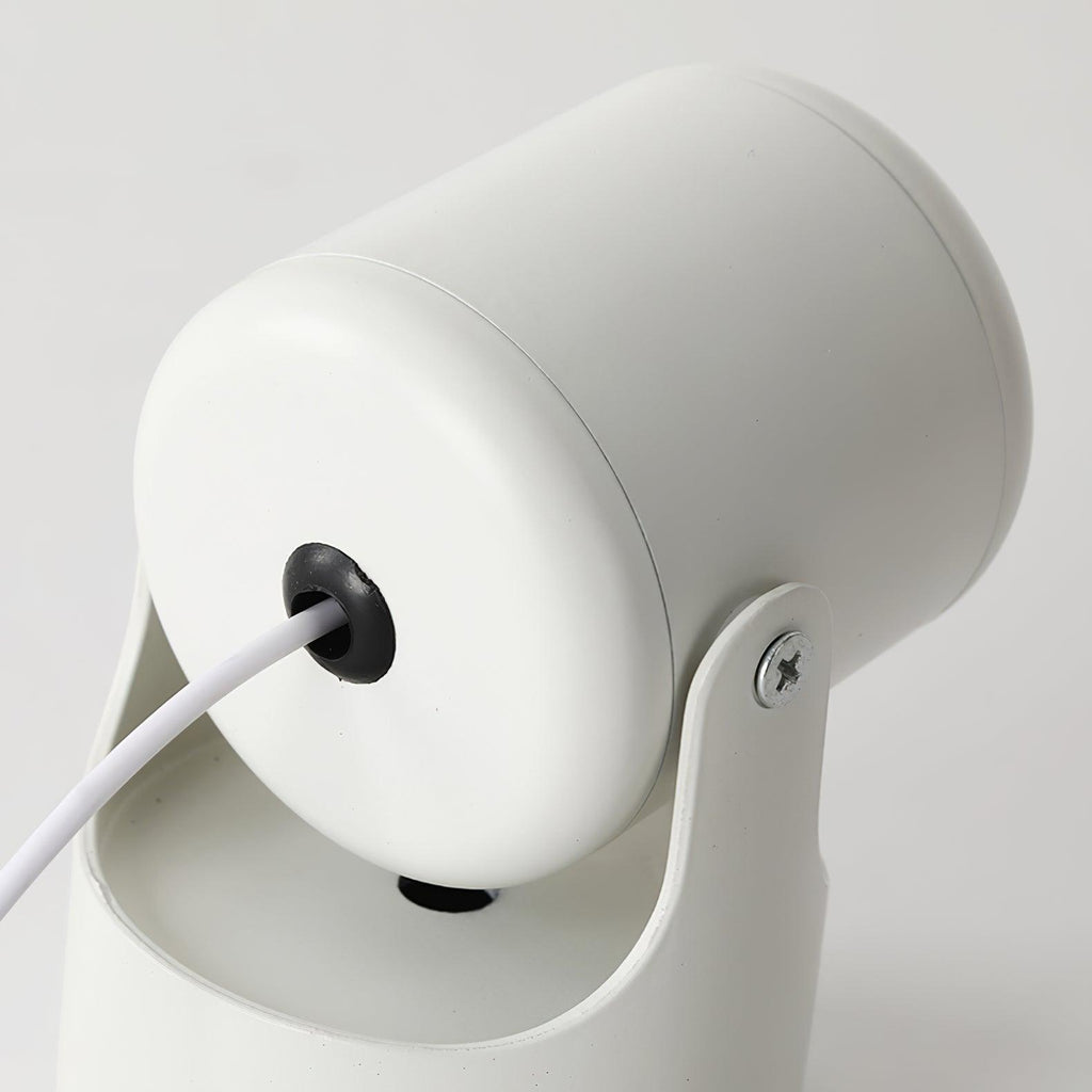 Close-up of the cable entry and swivel hinge on this white Clérachic projection lamp's base.