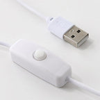 The USB cable and inline on/off switch for this Clérachic projection lamp, shown against a white background.