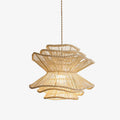 Against a white backdrop, this Clérachic pendant shows its spinning-top shape narrowing between two wave-edged rattan tiers.