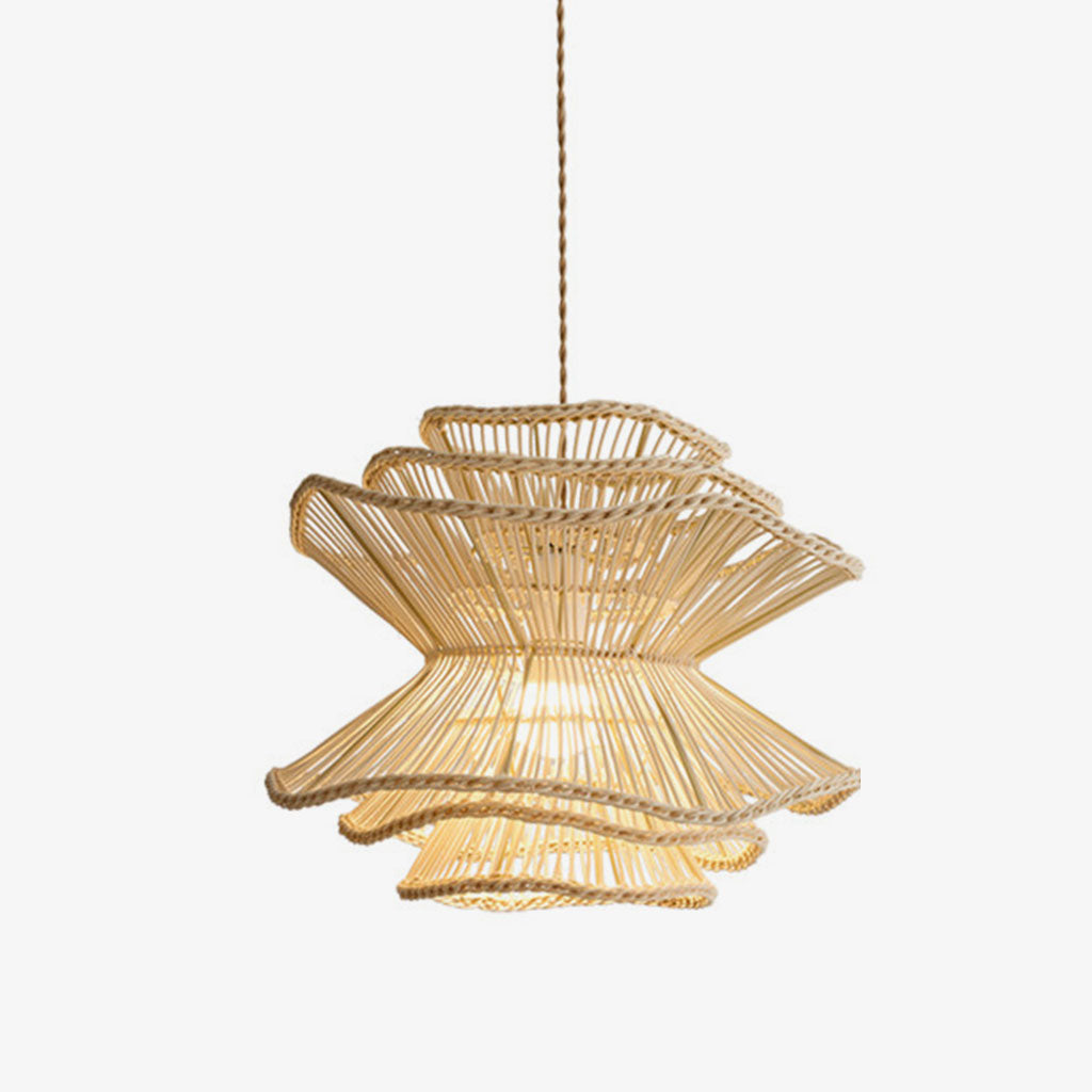 Against a white backdrop, this Clérachic pendant shows its spinning-top shape narrowing between two wave-edged rattan tiers.