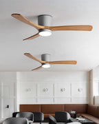 Wood-blade ceiling fan and light installed in a modern space