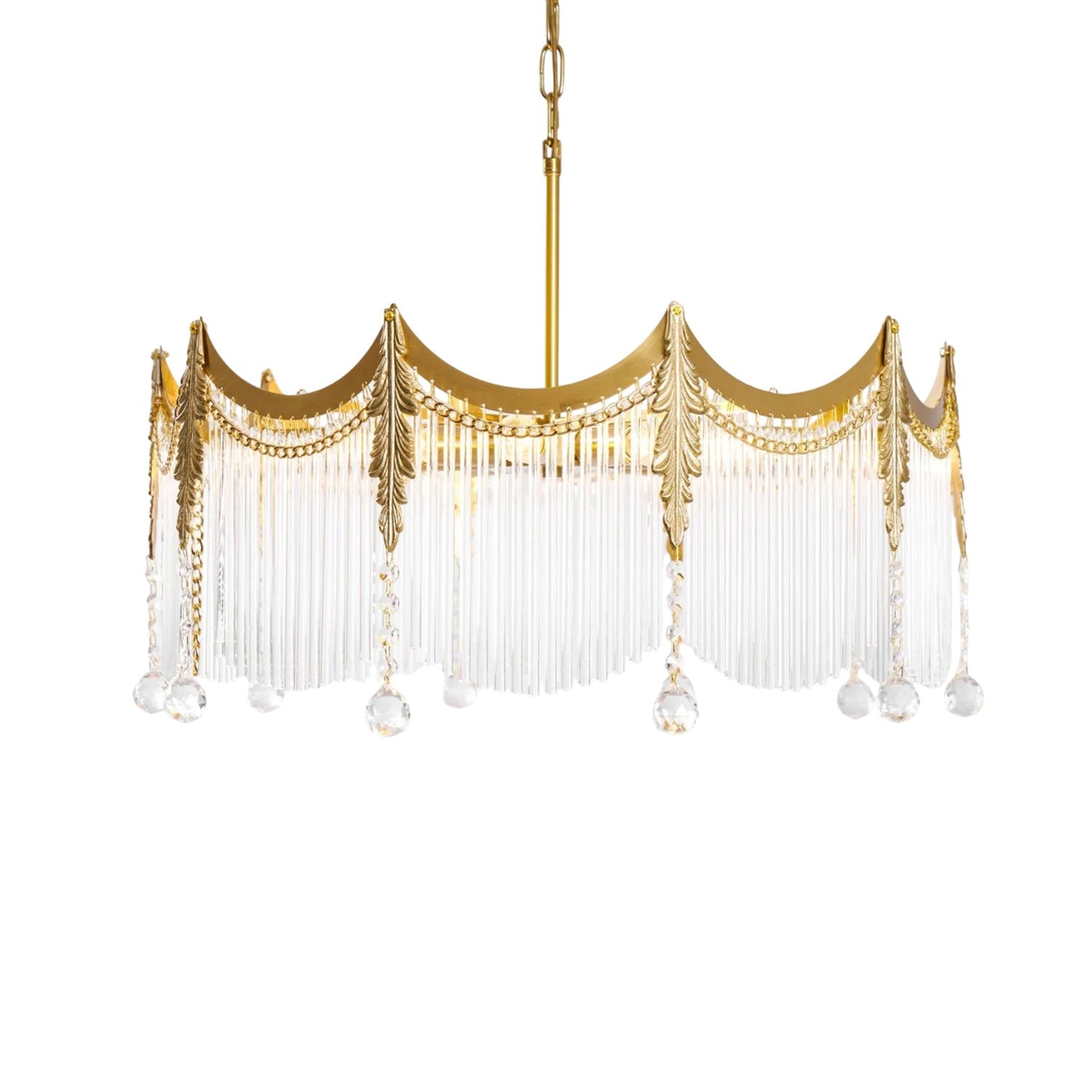 Multi-light copper chandelier with clear glass shades suspended in a bright interior