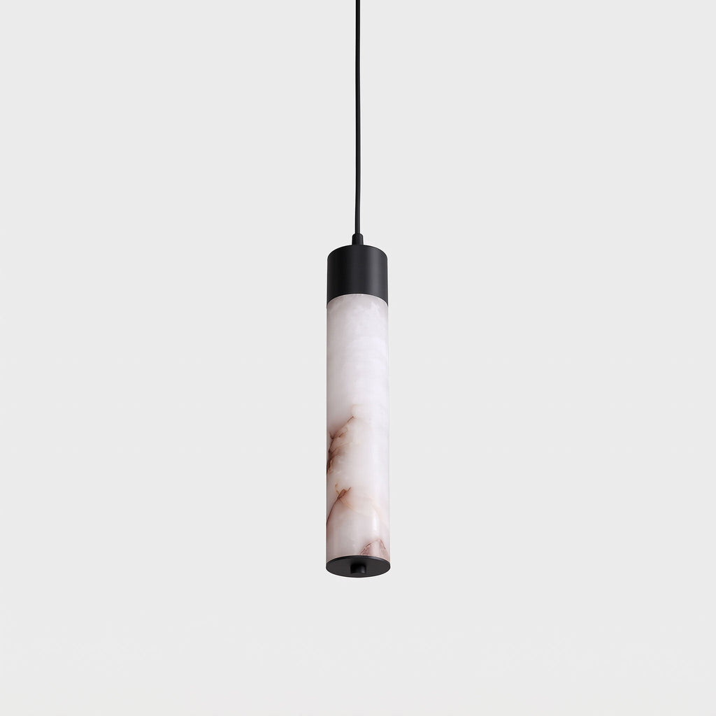 On a plain background, this Clérachic pendant shows a single alabaster tube capped in black.