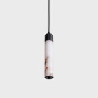 On a plain background, this Clérachic pendant shows a single alabaster tube capped in black.