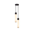 Against a white background, this Clérachic pendant's two black-capped alabaster tubes hang from a round black plate.