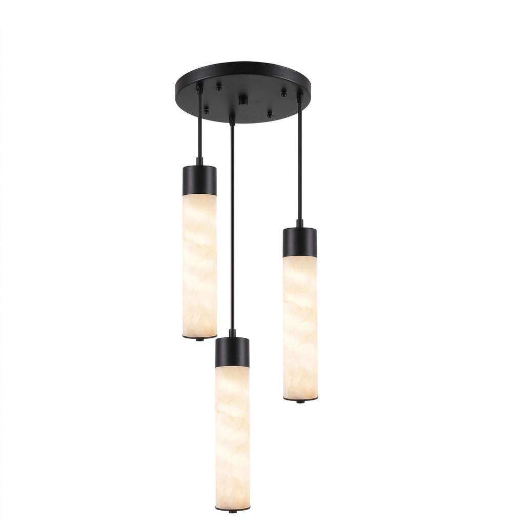 On a white background, three black-capped alabaster tubes hang at staggered heights from this Clérachic pendant.